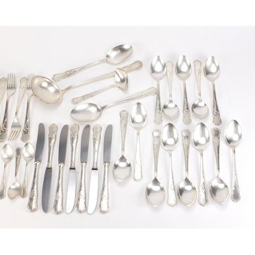 2786 - Suite of silver plated cutlery marked GJ100, the ladle 28cm in length