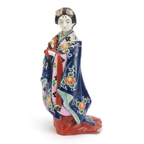 2157 - Japanese porcelain figure of a Geisha girl wearing a robe, 30cm high