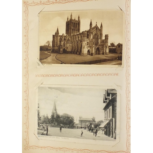 2671 - Edwardian and later mostly topographical postcards arranged in an album including street scenes