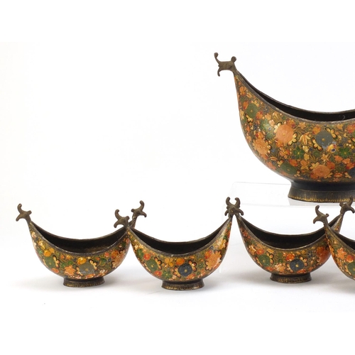 2736 - Six 19th century Russian lacquered boat dishes and a centre bowl, each hand painted with flowers, th... 