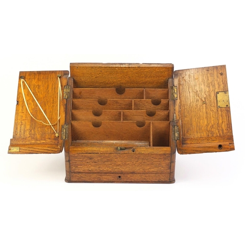 2096 - Edwardian oak stationary box with letter rack, 28cm high