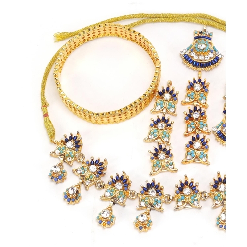 2835 - Indian gilt metal costume jewellery comprising two pendants, a pair of drop earrings, a necklace and... 