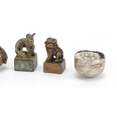 2881 - Chinese metalware including three miniature foo dog seals the largest 4.3cm high