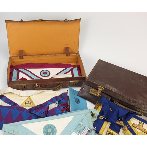 2898 - Masonic regalia including aprons and jewels housed in two brown leather cases