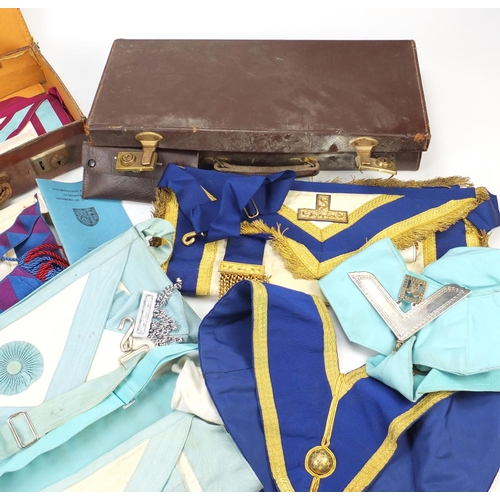 2898 - Masonic regalia including aprons and jewels housed in two brown leather cases