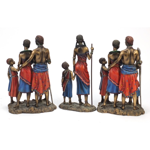 2201 - Three Masai figure groups by the Leonardo Collection, the largest 30cm high