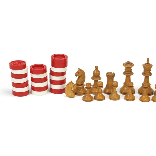 2809 - Turned wooden chess set and a set of draughts