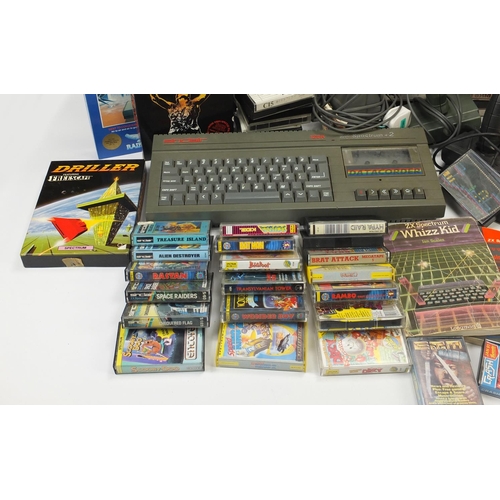 2329 - Vintage Sinclair ZX Spectrum+2 games console with a large selection of games