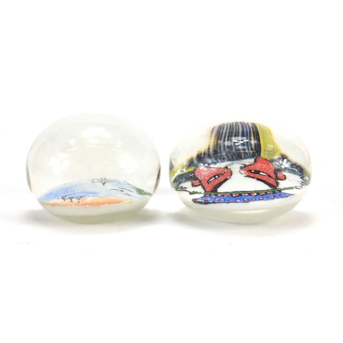 3016 - Two glass paperweights including one decorated with a Chinese Emperor, the largest 4.7cm in diameter