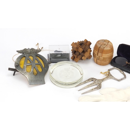 2844 - Objects including gold coloured metal spectacles, AA badge and wooden puzzles