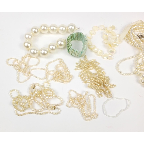 2780 - Group of simulated pearl necklaces and bracelets