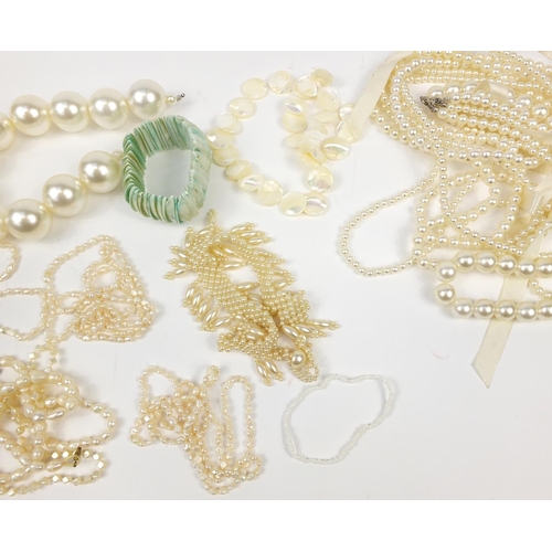 2780 - Group of simulated pearl necklaces and bracelets