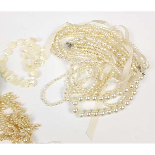 2780 - Group of simulated pearl necklaces and bracelets