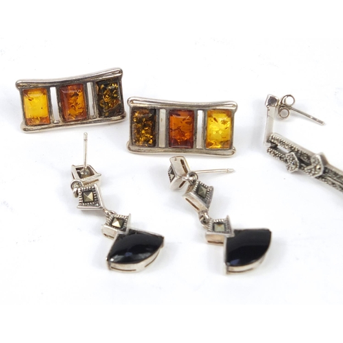 2770 - Three pairs of silver earrings including marcasite and amber examples