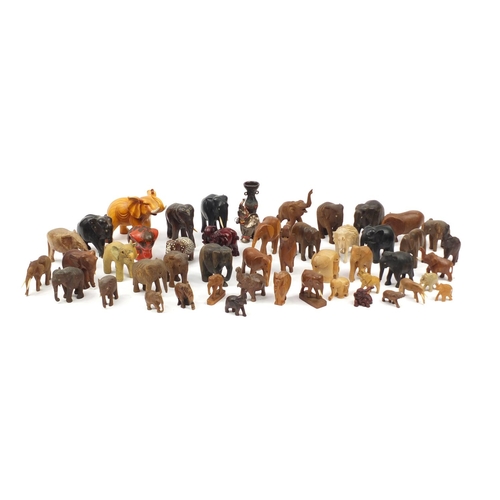 2468 - Large collection of mostly wooden elephants including some ebony, the largest 20cm high