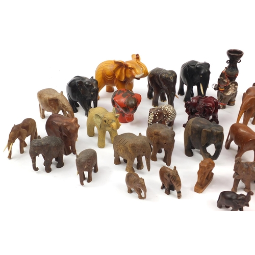 2468 - Large collection of mostly wooden elephants including some ebony, the largest 20cm high