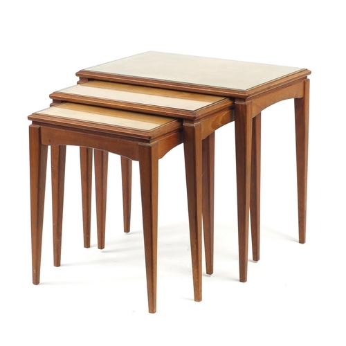 2014 - Nest of three mid century teak occasional tables with glass tops, the largest 50cm H x 53cm W x 37.5... 