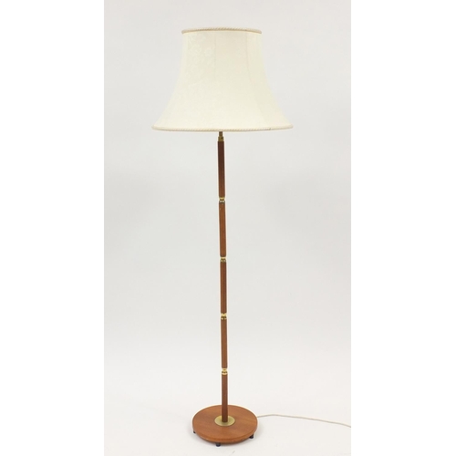 2089 - Teak and brass standard lamp with shade, 154cm high