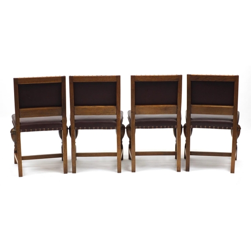 67 - Set of four Arts & Crafts inlaid oak dining chairs by James Shoolbred & Co, with carved cup and cove... 