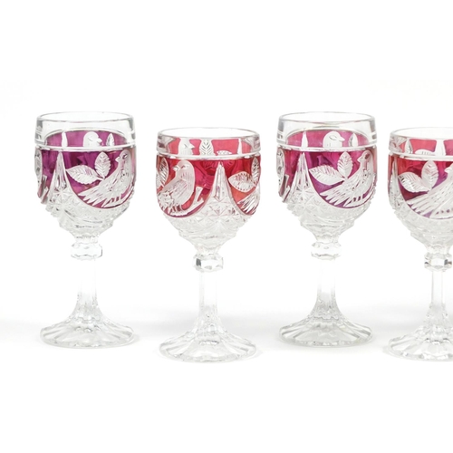 2550 - Set of six cranberry flashed glasses etched with birds, 16cm high