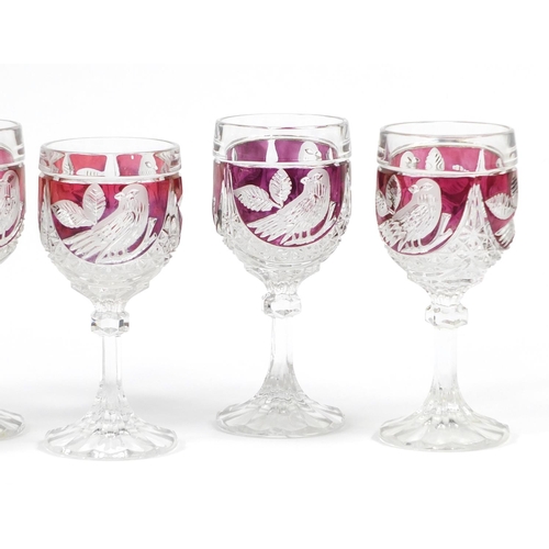 2550 - Set of six cranberry flashed glasses etched with birds, 16cm high