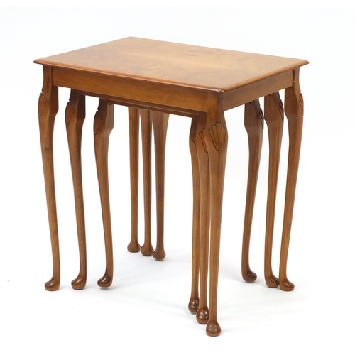 2059 - Nest of three walnut occasional tables