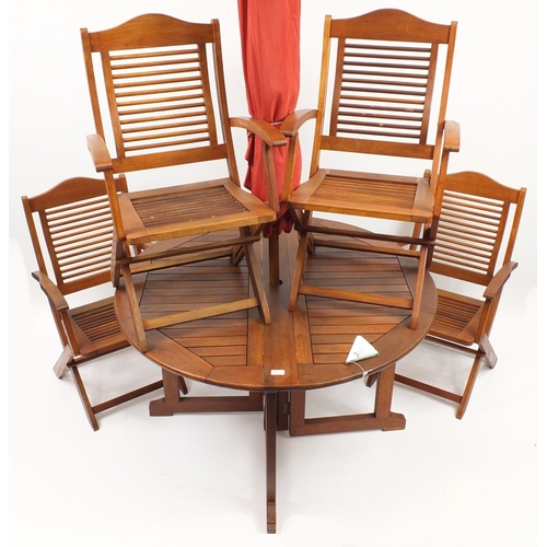 2008 - Firman teak folding garden table with four chairs and parasol