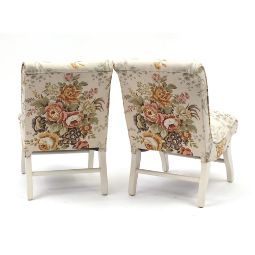 2067 - Pair of cream painted bedroom chairs with floral upholstery, 66cm high