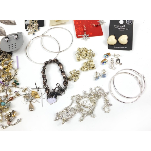 2895 - Large selection of costume jewellery earrings including some silver