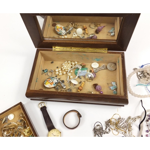 3021 - Costume jewellery including brooches, necklaces, rings and earrings housed in a wooden jewellery box