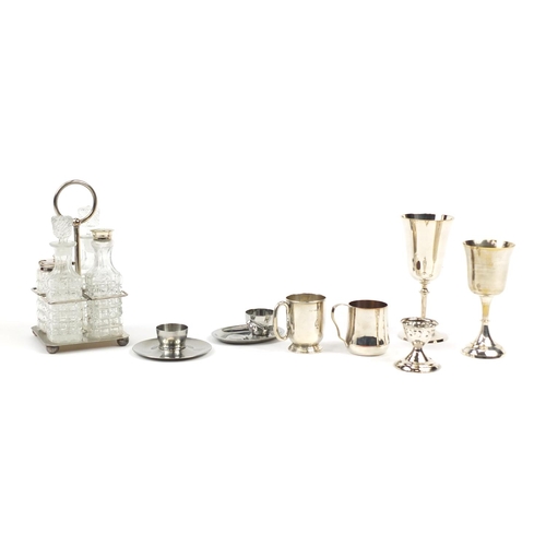 2301 - Silverplate and a silver christening tankard including a four bottle cruet on stand