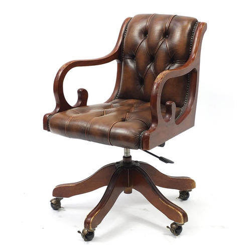 2045 - Mahogany framed captains chair with brown leather button back upholstery