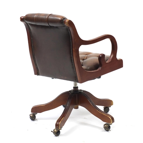 2045 - Mahogany framed captains chair with brown leather button back upholstery