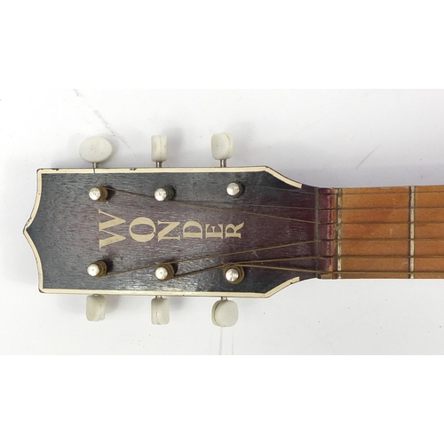 2229 - Wonder six string acoustic guitar with case