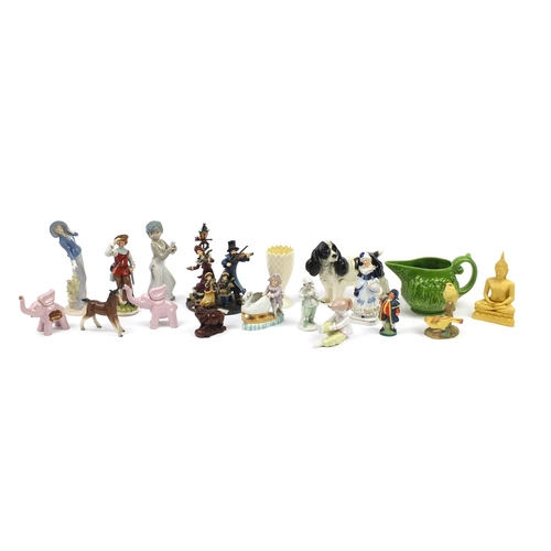 2455 - China figures and animals including a Belleek vase, Melba ware spaniel and Royal Worcester bird grou... 