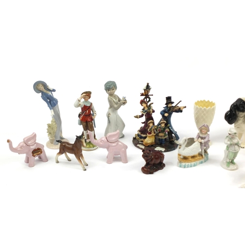 2455 - China figures and animals including a Belleek vase, Melba ware spaniel and Royal Worcester bird grou... 