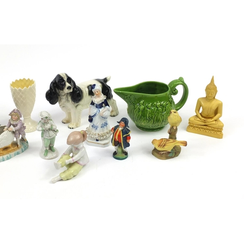 2455 - China figures and animals including a Belleek vase, Melba ware spaniel and Royal Worcester bird grou... 