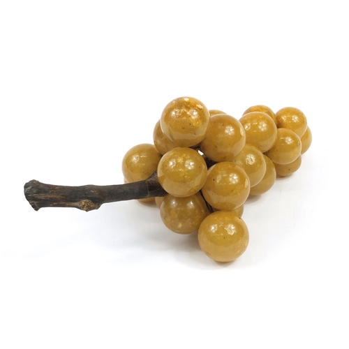 2797 - Polished stone bunch of grapes, 37cm in length