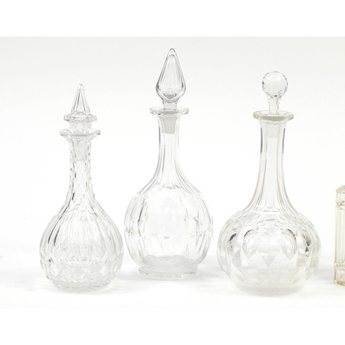 2285 - Glassware including a Continental etched and hand gilded glass and four decanters with stoppers