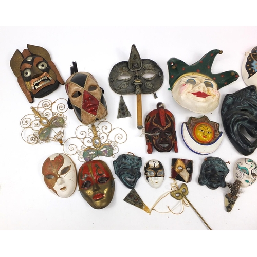 2508 - Group of decorative masks including paper mache examples