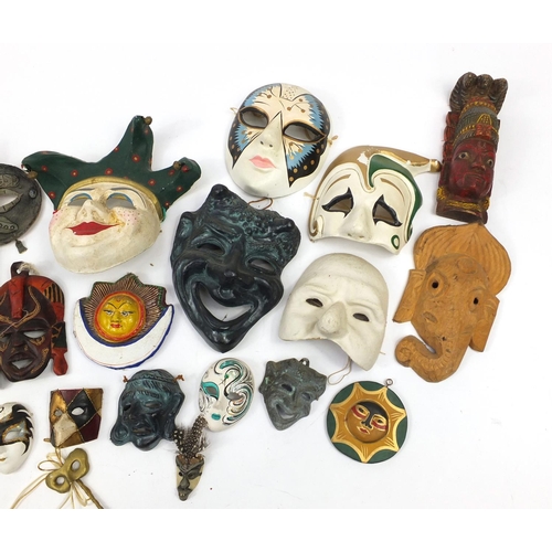 2508 - Group of decorative masks including paper mache examples