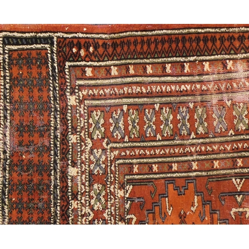 2023 - Afghan brown ground rug with all over geometric design, 190cm x 125cm