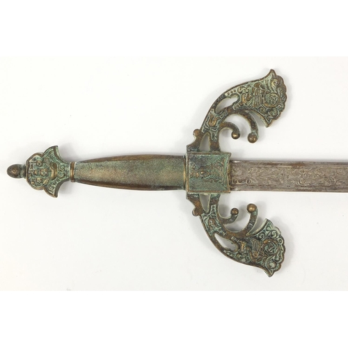 2900 - Continental medieval style sword with engraved steel blade, 75cm in length