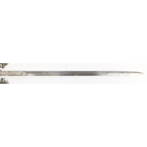 2900 - Continental medieval style sword with engraved steel blade, 75cm in length