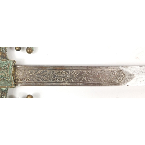 2900 - Continental medieval style sword with engraved steel blade, 75cm in length