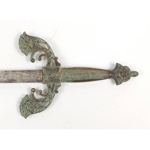 2900 - Continental medieval style sword with engraved steel blade, 75cm in length