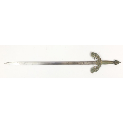 2900 - Continental medieval style sword with engraved steel blade, 75cm in length