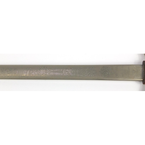 2909 - Masonic interest Wilkinson ceremonial sword with engraved steel blade, 89.5cm in length