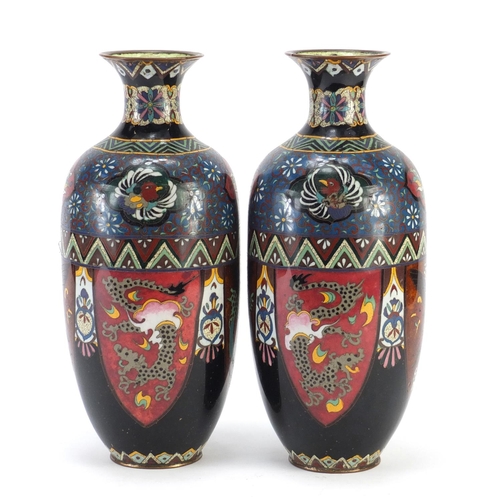 83 - Pair of Japanese cloisonne vases, enamelled with panels of birds of paradise and dragons, each 30cm ... 