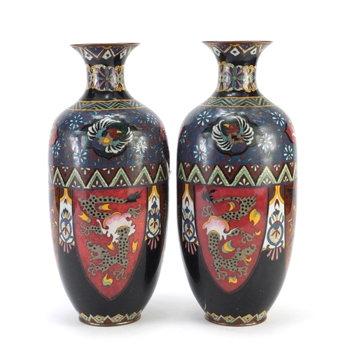 83 - Pair of Japanese cloisonne vases, enamelled with panels of birds of paradise and dragons, each 30cm ... 